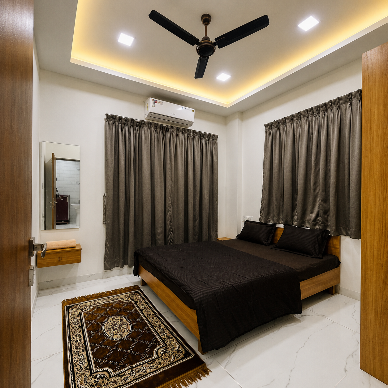 Bedroom 1 with AC, double bed and attached bathroom at Saanjh villa